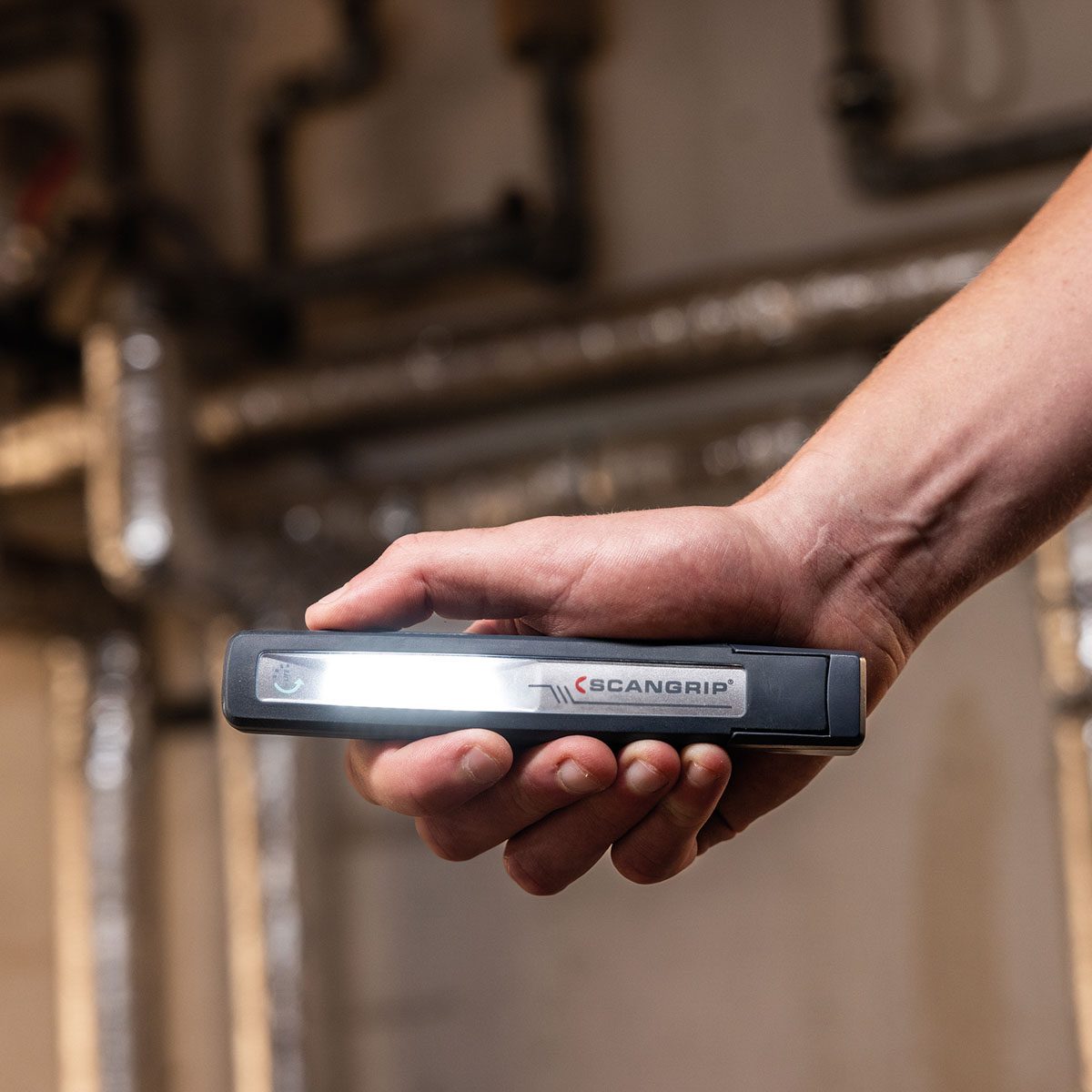 Wygodna akumulatorowa lampa robocza LED 2 w 1 150 lm 1,1 W Scangrip UNIPEN forLIFE 03.6209 - obrazek 17